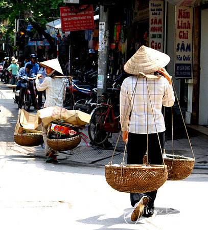 Women Carrying Baskets